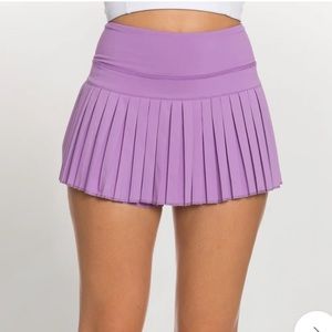 Gold hinge pleated tennis skirt